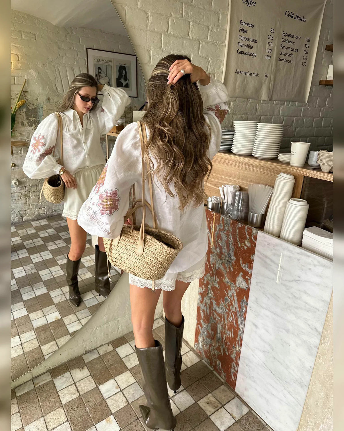 Back view of the white balloon-sleeve blouse