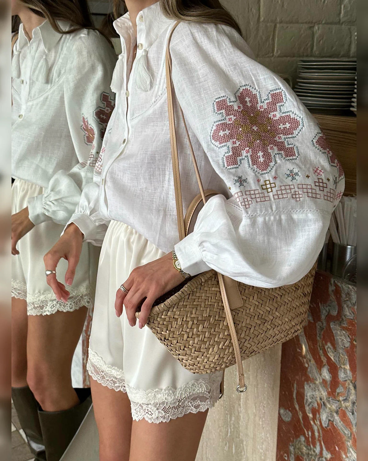 Close-up of the folk-inspired sleeve embroidery and cuff